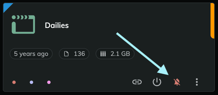 A Screening Room card with a crossed-out bell button at the bottom right, marked by an arrow. The button mutes the Room.