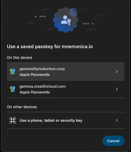 The Chrome window 'Use a saved passkey for mnemonica.io'. Under 'On this device', each email address shows 'Apple Passwords' below it.